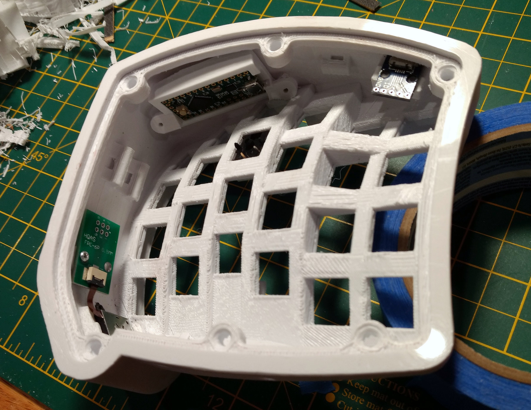 Underside of printed case with electronics mounted