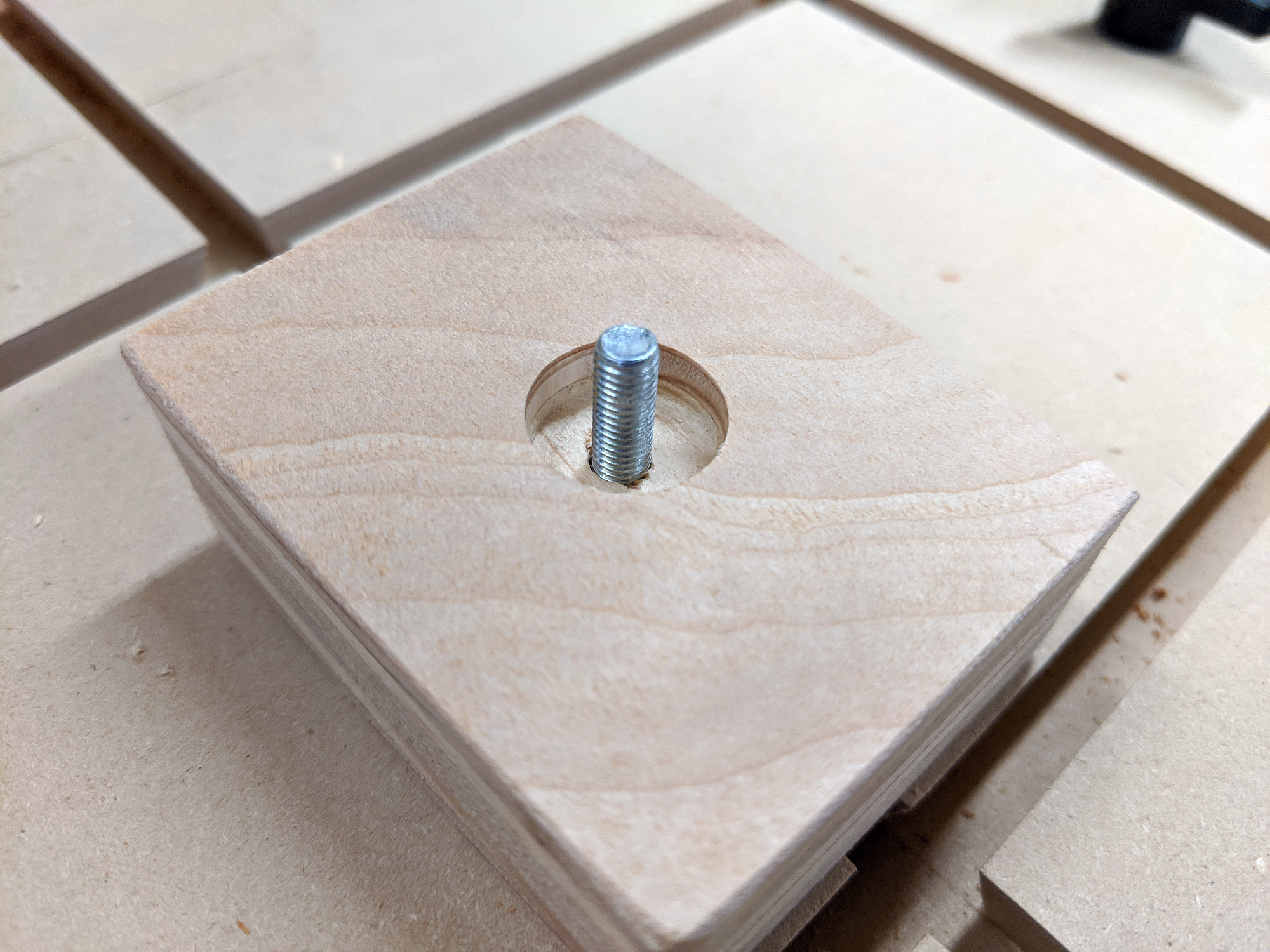 Clamping block with counterbored hole